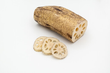 Fresh lotus root and piece lotus root on the white background.