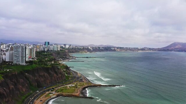 Costa verde ocean dn cliff move up Miraflores, Lima, Peru 4k