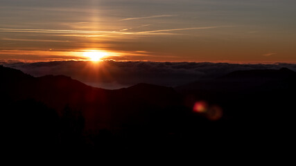 Bright Sun shining over the clouds on a mountain landscape in Montseny, Catalonia
