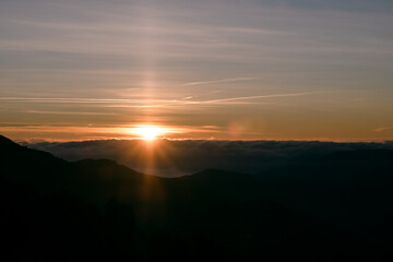 Bright Sun shining over the clouds on a mountain landscape in Montseny, Catalonia