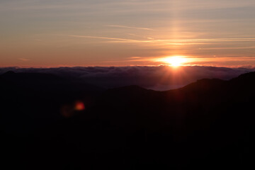 Bright Sun shining over the clouds on a mountain landscape in Montseny, Catalonia