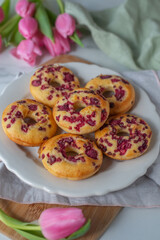 sweet vanilla raspberry donuts on a table