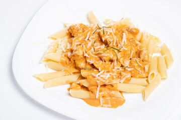 details of tasty fresh restaurant chicken pasta with red sauce