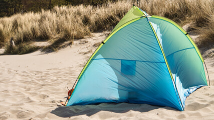 a tent for wind protection on the beach of the Baltic Sea in summer vacation © Martin