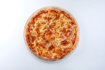fresh pizza on the white plate