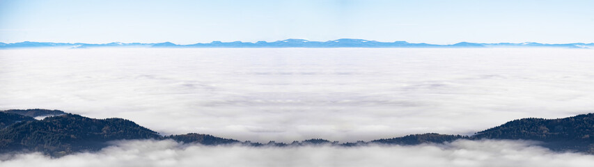 Sea of fog and snowy mountains in the background - Amazing mystical rising fog sky forest snow...