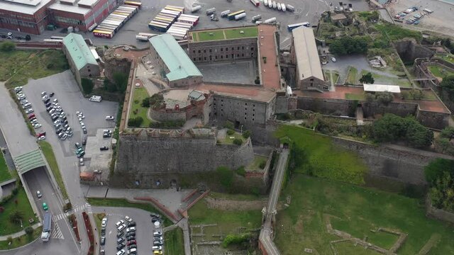 Aerial view around the Priamar Fortress and the Savona city, Italy - orbit, drone shot