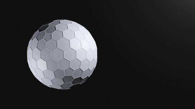 3d white sphere of hexagons rotates in a dark background