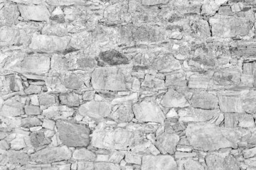 Old grungy flat retro brick wall of ancient city. Uneven bright pitted peeled surface brickwork of cellar worn. Ruined minimal bumpy washed blocks.Hard clear ragged holes brickwall of 3D grunge design