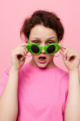 attractive young woman Youth clothing green sunglasses posing modern style