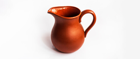 clay jug for milk on a white background