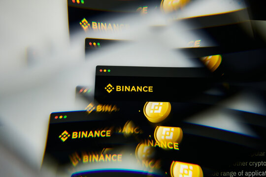 Milan, Italy - January 11, 2022: binance coin - BNB logo on laptop screen seen through an optical prism. Dynamic and unique image form binance coin, BNB coin website. Illustrative editorial.