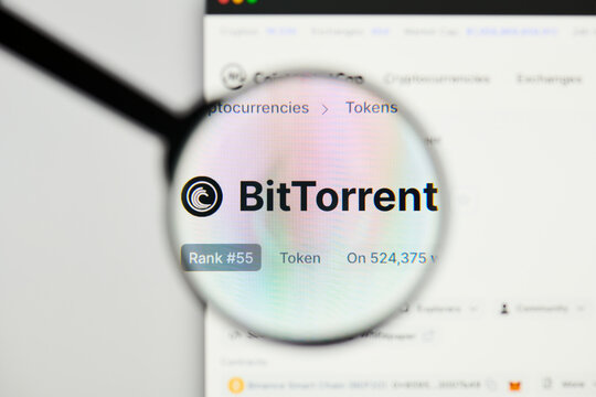 Milan, Italy - January 11, 2022: bittorrent - BTT website's hp.  bittorrent, BTT coin logo visible through a loope. Defi, ntf, cryptocurrency concepts illustrative editorial.