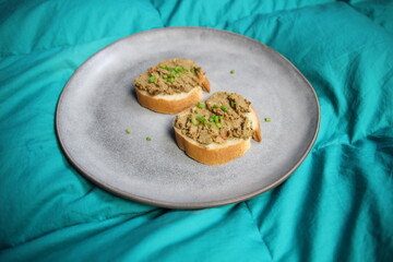 beef liver pate and bread sandwich on plate