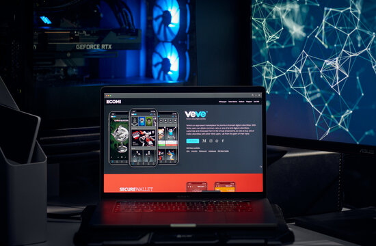 Milan, Italy - January 11, 2022: ecomi - OMI website's hp seen on a laptop screen. ecomi, OMI coin logo visible. Cryptocurrency, defi, nft concepts illustrative editorial.