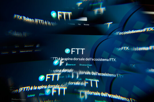 Milan, Italy - January 11, 2022: ftx token - FTT logo on laptop screen seen through an optical prism. Dynamic and unique image form ftx token, FTT coin website. Illustrative editorial.