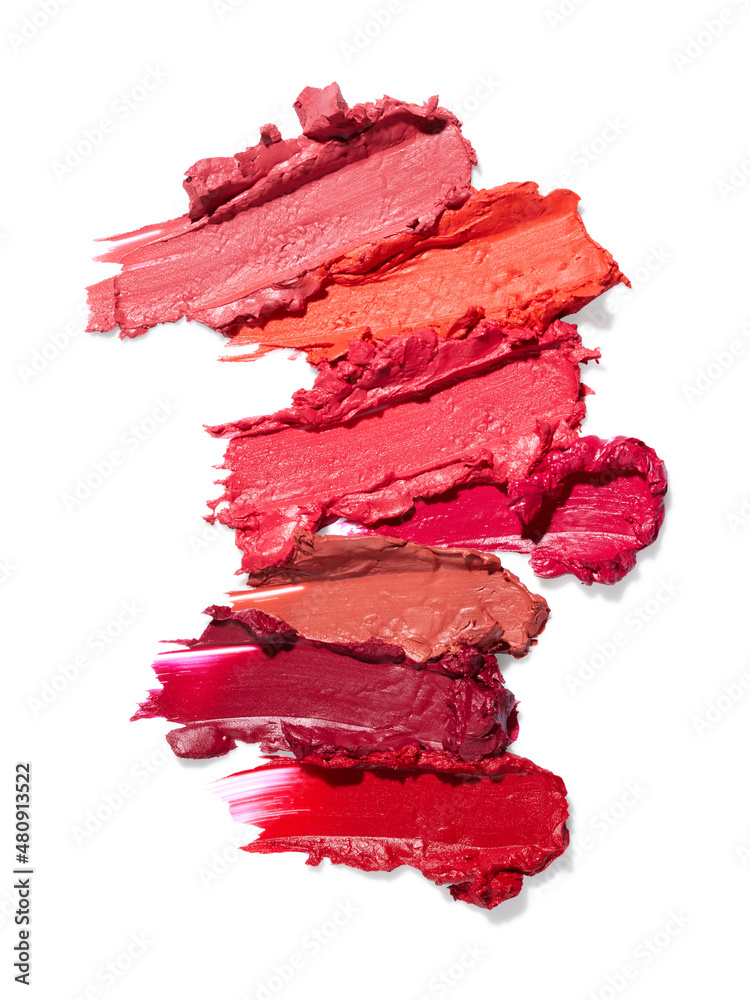 Wall mural Red lipsticks smudge isolated on white background