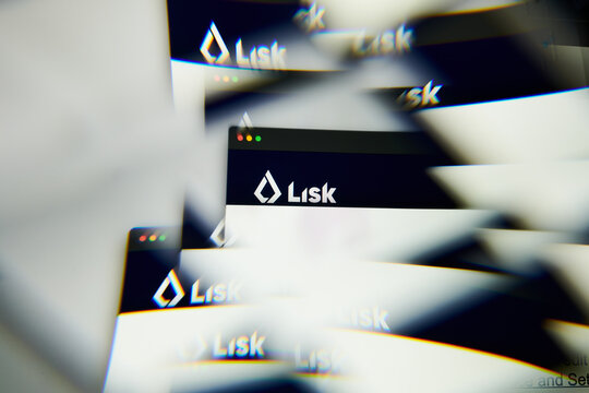 Milan, Italy - January 11, 2022: lisk - LSK logo on laptop screen seen through an optical prism. Dynamic and unique image form lisk, LSK coin website. Illustrative editorial.
