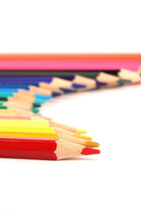 Obraz premium A close-up of colorful crayons isolated on a white background 