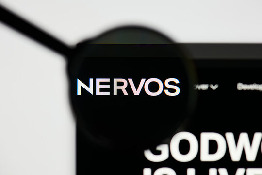 Milan, Italy - January 11, 2022: nervos network - CKB website's hp.  nervos network, CKB coin logo visible through a loope. Defi, ntf, cryptocurrency concepts illustrative editorial.