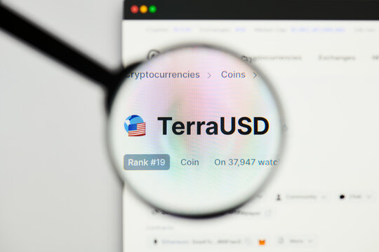 Milan, Italy - January 11, 2022: terrausd - UST website's hp.  terrausd, UST coin logo visible through a loope. Defi, ntf, cryptocurrency concepts illustrative editorial.