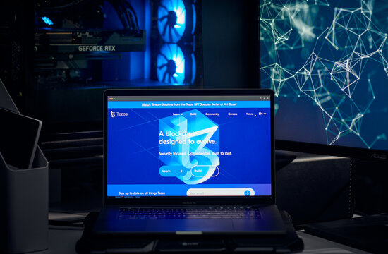 Milan, Italy - January 11, 2022: tezos - XTZ website's hp seen on a laptop screen. tezos, XTZ coin logo visible. Cryptocurrency, defi, nft concepts illustrative editorial.