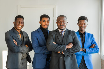 team of stylish african men in suits	
