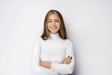 Fototapeta premium portrait of young happy woman looks in camera
