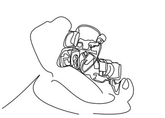 cameraman recording with a big camera on his shoulder