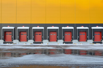 Exterior view of the warehouse in winter. Loading docks.