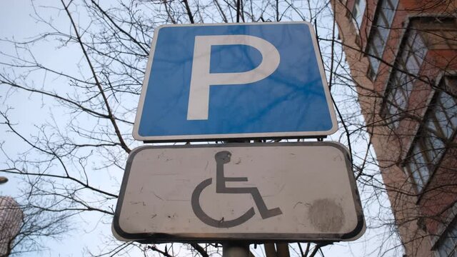 Parking sign for a disabled persons