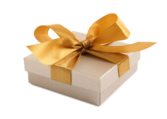 Golden gift box with satin bow on white background