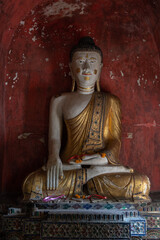 Obraz premium Beautiful Shan style Buddha subduing Mara statue in old vihara at ancient Wat Pa Pao buddhist temple, Chiang Mai, Thailand