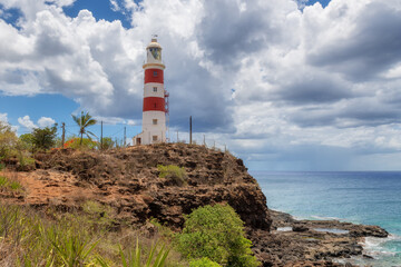 Fototapeta na wymiar Lighthouse in Mauritius Island. Pointe aux Caves also known as Albion lighthouse, white and red color, Mauritius.