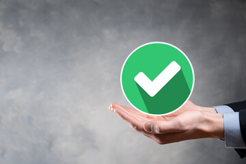 Hand holds green icon Check mark,Check Mark Sign, Tick Icon,right sign,circle green checkmark...