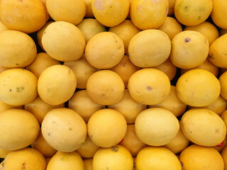 top view of fresh lemons on the supermarket shelf