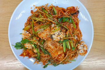Korean steamed angler fish with plenty of bean sprouts and spicy seasoning