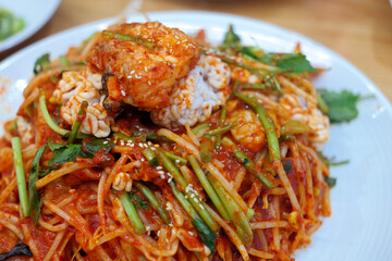 Korean steamed angler fish with plenty of bean sprouts and spicy seasoning