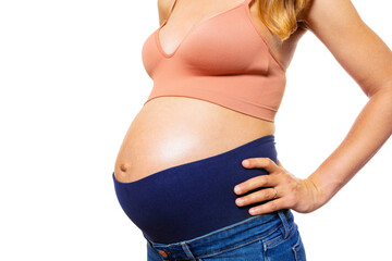 Big belly of a pregnant woman with maternity jeans