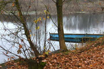 Lake River And Old Wooden Blue Fishing Boat - 480927193