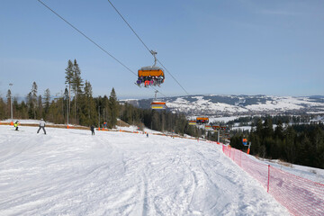 Ski slope in popular winter resort Kotelnica Bialczanska in polish mountains, Podhale region.