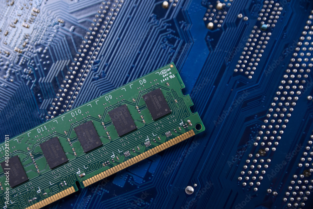 Poster Computer memory RAM on motherboard background . Close up. system, main memory, random access memory, onboard, computer detail. Computer components . DDR3. DDR4. DDR5