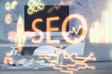 Double exposure of SEO drawing and office interior background. Concept of Search optimization...