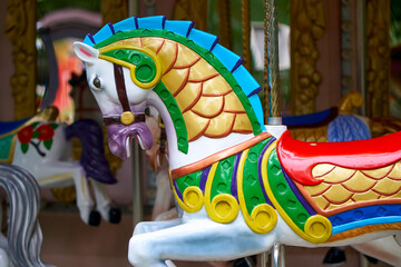 Carousel horse in the park. - 480929334