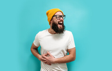 A sick man is in severe pain due to gallstones. A young man with a beard suffers from gallbladder...
