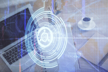 Multi exposure of woman hands working on computer and data theme hologram drawing. Tech concept.
