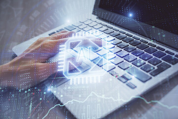 Double exposure of woman hands working on computer and data theme hologram drawing. Tech concept.