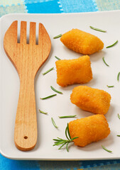 Potatoes croquettes and rosemary spice dish.