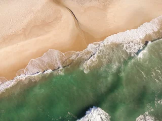 Foto op Canvas Aerial view of Prainha Beach, a paradise in the west side of Rio de Janeiro, Brazil. Greenish sea waves and sand. Top view. Sunny day at dawn. Drone Photo © Diego