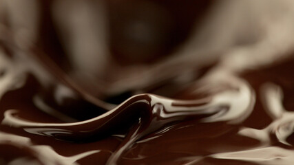 Detail of splashing melted chocolate.